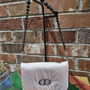 Elegant Pink Satin Bag with DIOR SYMBOL attached Black Beaded Strap